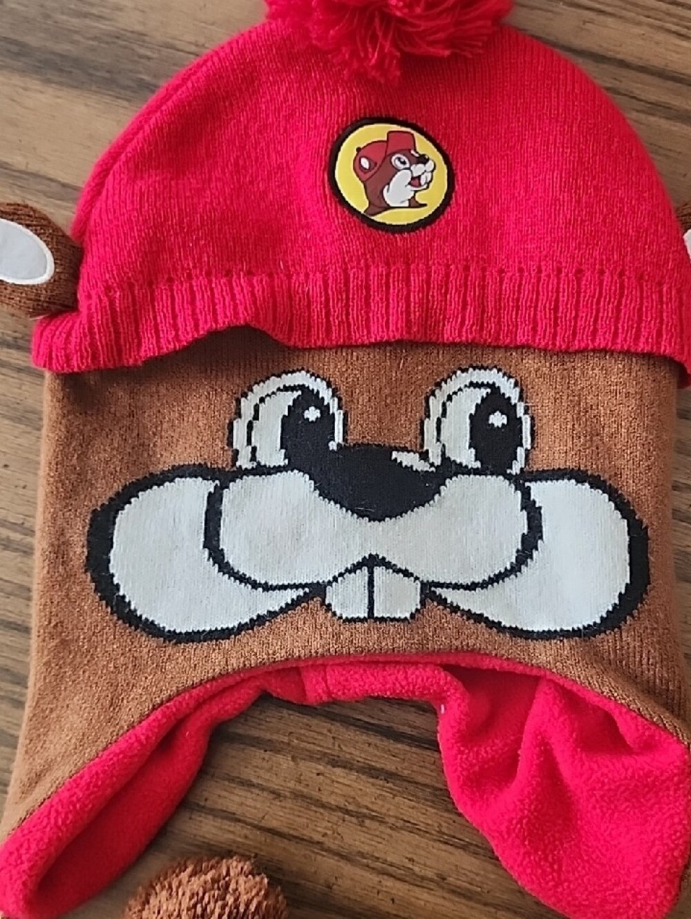 Buc-ee’s Beaver Face Knit Earflap Beanie Hat with Poms - Picture 2 of 7